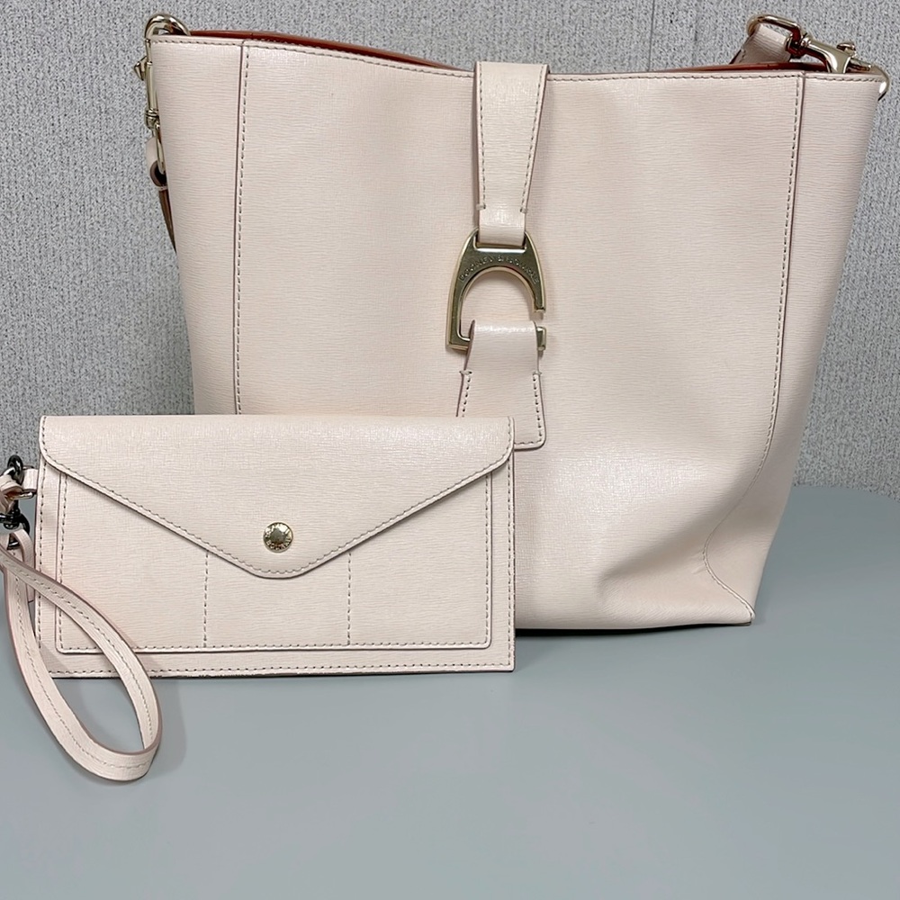 Dooney & Bourke blush pink shoulder bad with wristlet.